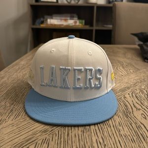 Brand new, never worn LA Lakers hat. Downsizing my collection. Size 7.